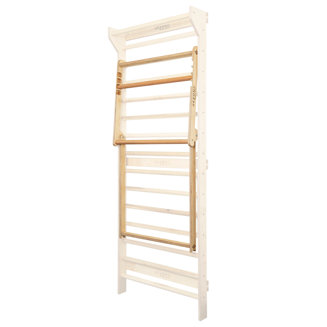 Pull-up dip station hanging flush in the stored position.