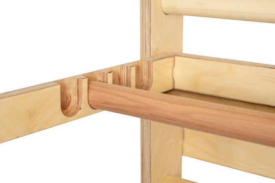 Close up detail of dip bar in adjustable slots.