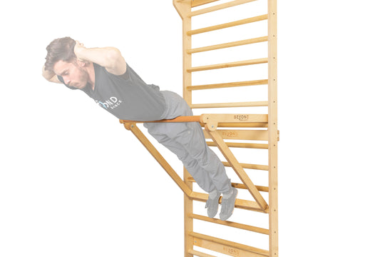 PD station in middle location with athlete performing back crunches.